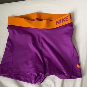 Purple and Orange Nike Pro Spandex Shorts